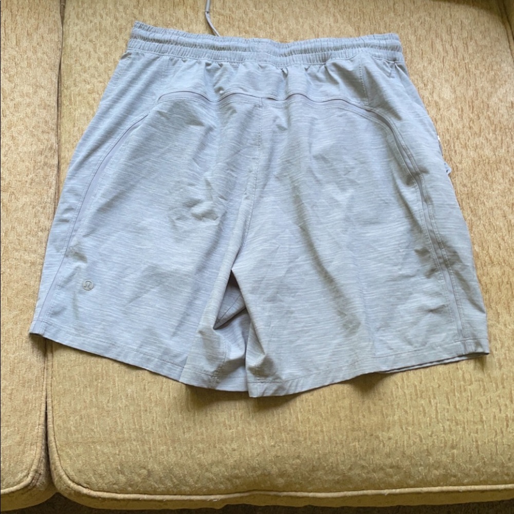 Lulu lemon gray shorts size 6 inch length and size large waist.